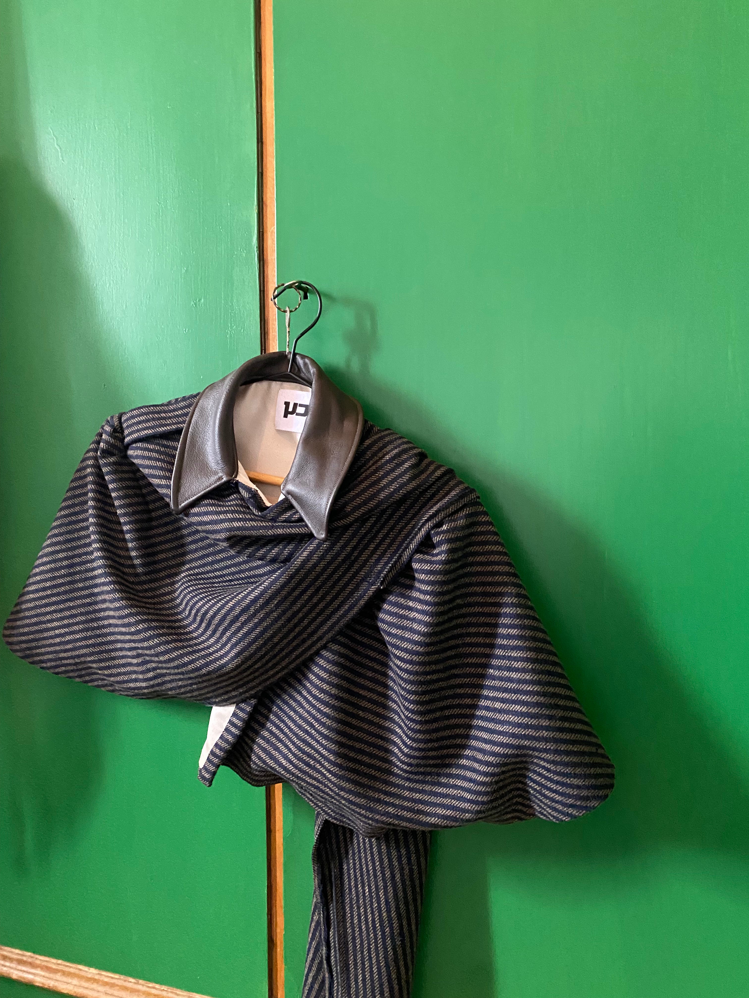 The wool & leather mini cape